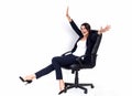 Happy successful business woman in office chair Royalty Free Stock Photo