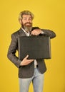 Happy and successful man hold money case. bearded man show office briefcase. good business deal. successful business