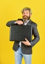 Happy and successful man hold money case. bearded man show office briefcase. good business deal. successful business