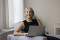 Happy successful mature freelance business woman working from home Royalty Free Stock Photo