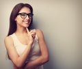 Happy successful smiling young woman in glasses thinking. Vintage portrait