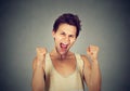 Happy successful student, man winning fists pumped celebrating success Royalty Free Stock Photo