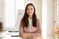 Happy successful young business coach posing in office boardroom Royalty Free Stock Photo