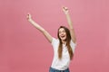 Happy successful young woman with smiling,shouting and celebrating success over pink background Royalty Free Stock Photo