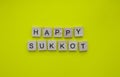 happy Sukkot, a minimalistic banner with an inscription in wooden letters Royalty Free Stock Photo