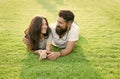 Happy summer. Happy family relax on green grass. Couple in love dating on natural landscape. Happy vacation. Family Royalty Free Stock Photo