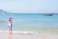 Happy summer time, women open hand with colorful hat enjoy on sea beach