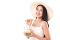 Happy summer woman enjoying fresh coconut juice