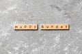 Happy sunday word written on wood block. Happy sunday text on cement table for your desing, concept Royalty Free Stock Photo