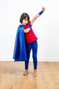 Happy superhero having fun for girl power and feminism concept