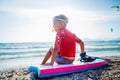 Happy Surfing boy. Royalty Free Stock Photo