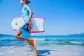 Happy Surfing girl. Royalty Free Stock Photo