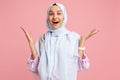 Happy arab woman in hijab. Portrait of smiling girl, posing at studio background