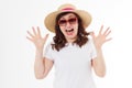 Happy surprised and excited woman in summer hat, sunglasses and template white t shirt isolated on white background. Holiday