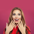 Happy surprised girl portrait. Beautiful young excited woman on colorful bright pink background Royalty Free Stock Photo