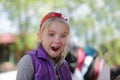 Happy surprised little girl, outdoor portrait Royalty Free Stock Photo