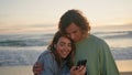 Happy sweethearts listening music embracing at sundown close up. Couple bonding Royalty Free Stock Photo