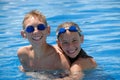 Happy swimmers in pool Royalty Free Stock Photo