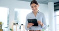 Happy, tablet and business woman in office doing research for a corporate legal project. Smile, digital technology and Royalty Free Stock Photo