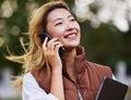 Happy, talking and a woman on a phone call while thinking in the city for business or networking. Smile, idea and an Royalty Free Stock Photo