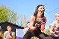 Energetic Outdoor Piloxing Session Unites Enthusiastic Participants Royalty Free Stock Photo