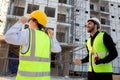 Happy team of architect or engineer with success and glad at construction site, team contractor or worker or partner glad. Royalty Free Stock Photo