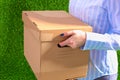 Happy team of businesspeople moving office, packing boxes, smiling Royalty Free Stock Photo