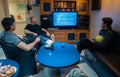 Happy team of ship officers watch TV onboard of vessel Royalty Free Stock Photo