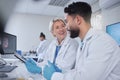 Happy, teamwork or scientist working on tablet in lab for medical search, innovation or science study in lab. Medicine Royalty Free Stock Photo