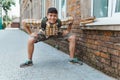 Happy teen boy portrait on the way to school, education and back to school concept Royalty Free Stock Photo