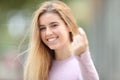 Happy teen gesturing come here in the street Royalty Free Stock Photo