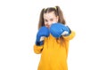 happy teen girl boxer in boxing gloves ready to fight and punch isolated on white, punch