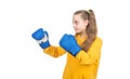 happy teen girl boxer in boxing gloves ready to fight and punch isolated on white, punch