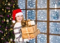 Happy teen girl with gift boxes in their hands Royalty Free Stock Photo