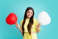 Happy teen girl hold red heart party balloon for valentines day, love symbol, be my valentine. Happy kids face, positive Royalty Free Stock Photo