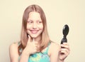 Happy teen girl looking at the mirror Royalty Free Stock Photo