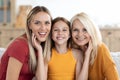 Happy teen girl posing with mom and grandma at home Royalty Free Stock Photo