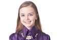 Happy teen girl in purple blouse posing