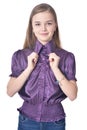 Happy teen girl in purple blouse posing