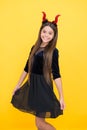 Happy teen girl wear devil horns costume on halloween party, celebrate happy halloween Royalty Free Stock Photo