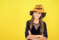 happy teen girl wear pumpkin hat on halloween costume party celebration at autumn traditional holiday of all saints Royalty Free Stock Photo