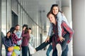 Happy teen girls and boys having good fun time outdoors. Royalty Free Stock Photo