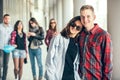 Happy teen girls and boys having good fun time outdoors. Royalty Free Stock Photo