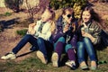 Happy teen girls eating an ice cream outdoor Royalty Free Stock Photo