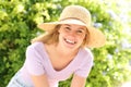 Happy teen looks at camera in a park Royalty Free Stock Photo