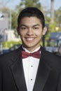 Happy Teenage Boy In Tuxedo At Quinceanera