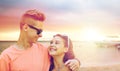 Happy teenage couple hugging on summer beach Royalty Free Stock Photo