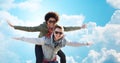 Happy teenage couple in shades having fun outdoors Royalty Free Stock Photo