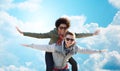 Happy teenage couple in shades having fun outdoors Royalty Free Stock Photo