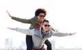 Happy teenage couple in shades having fun outdoors Royalty Free Stock Photo